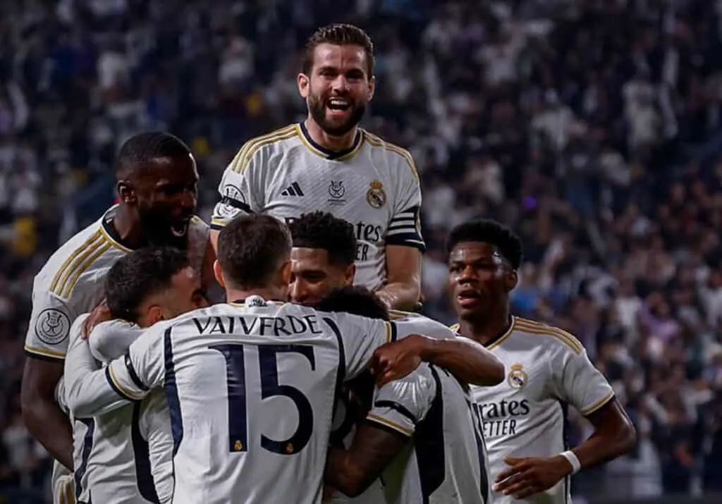 Real Madrid players celebrate after scoring a goal in their Riyadh Showdown, following Real's Spectacular 5-3 Win.