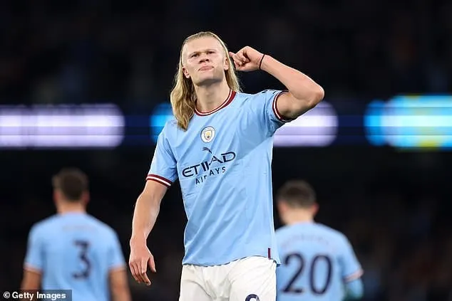 The Manchester City player celebrates his goal after a draft victory.