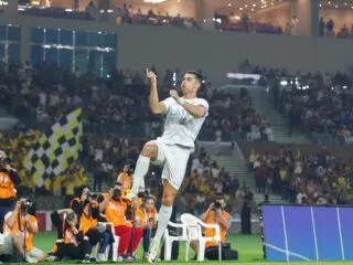 Ronaldo, a soccer player, celebrates after scoring a goal in the Soccer Saga.