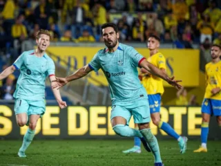 A Barcelona soccer player celebrates after scoring a last-minute goal in a dramatic comeback.